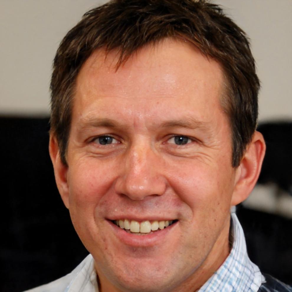 Professional headshot of satisfied financial planning client